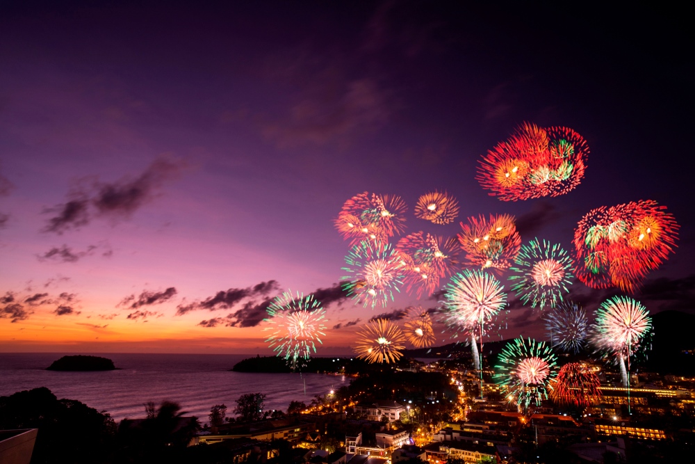 New year celebration in Phuket with fireworks over the sea